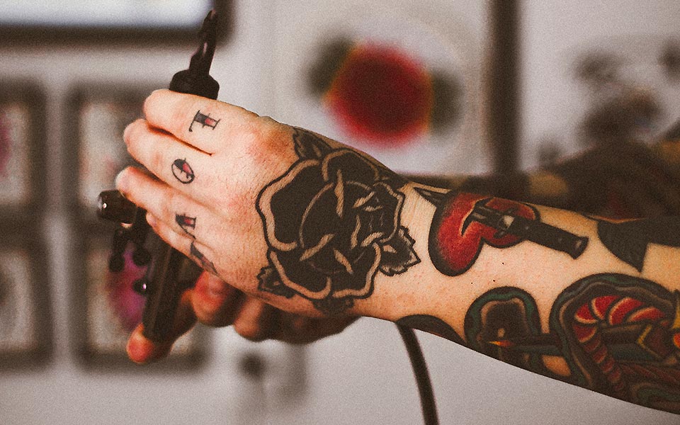 Custom Body Tattoos Person with Tattoos on Hand and Arm